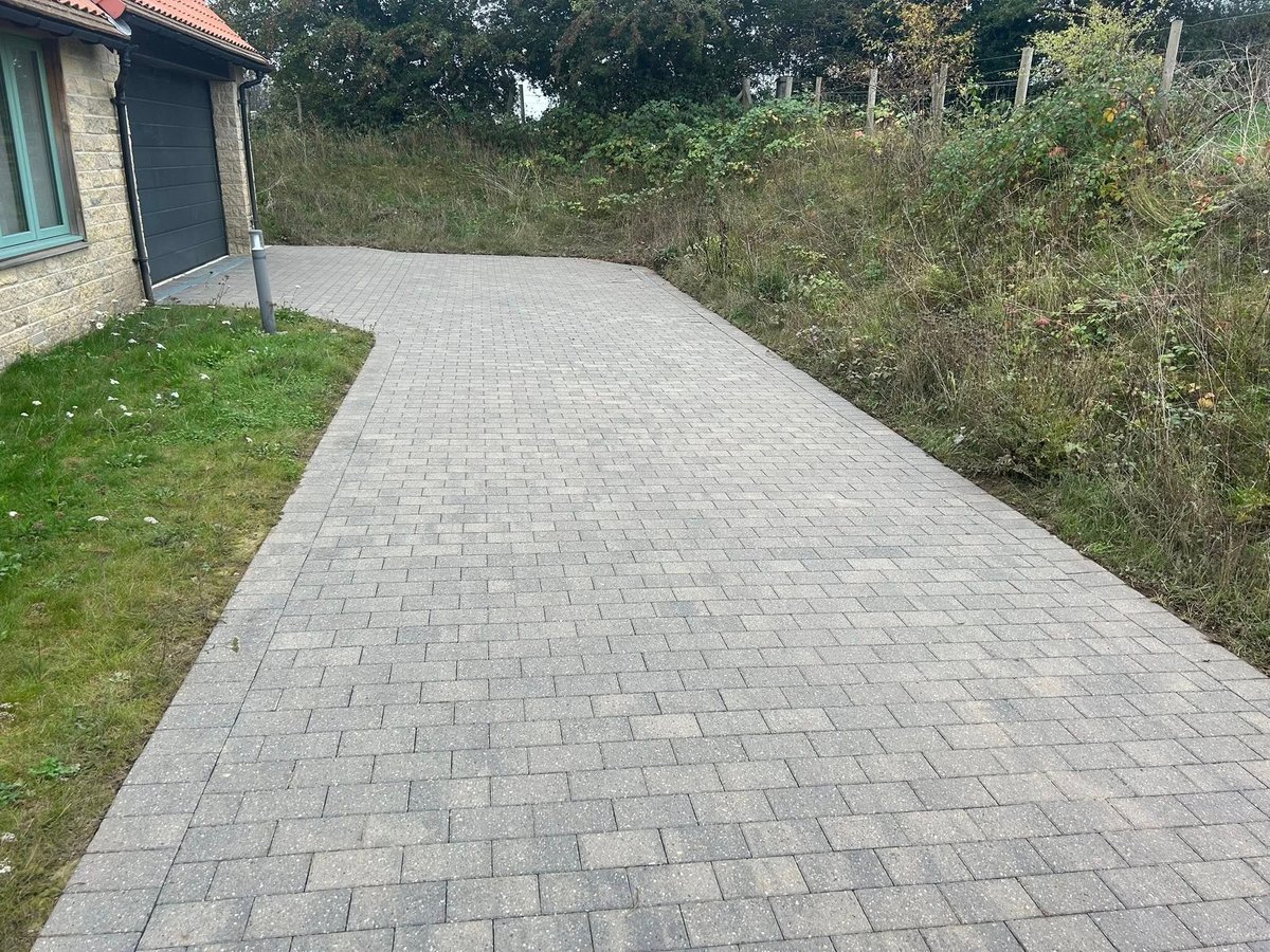 Clean driveway after pressure washing